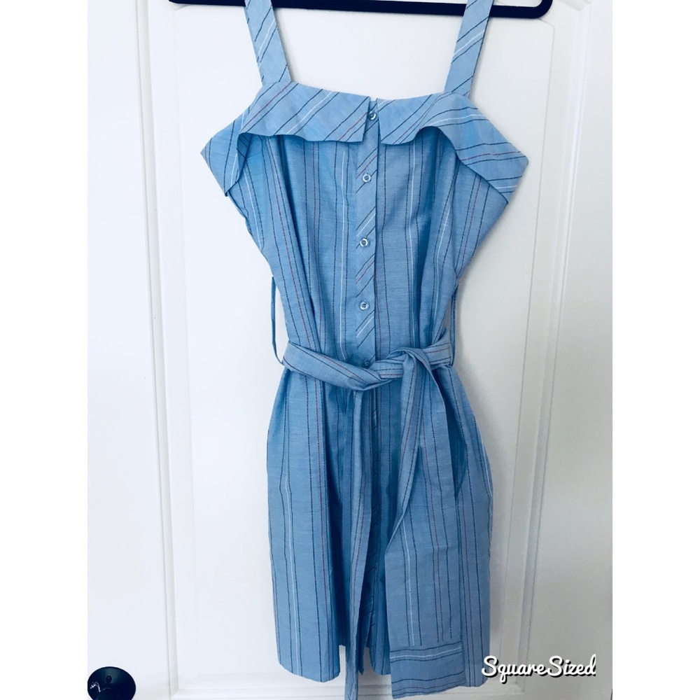 BRAND NEW dress will tag and extra button